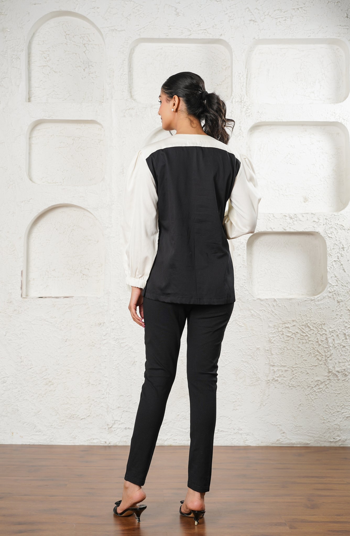 Ivory Pleated Top with Black Bow Accents