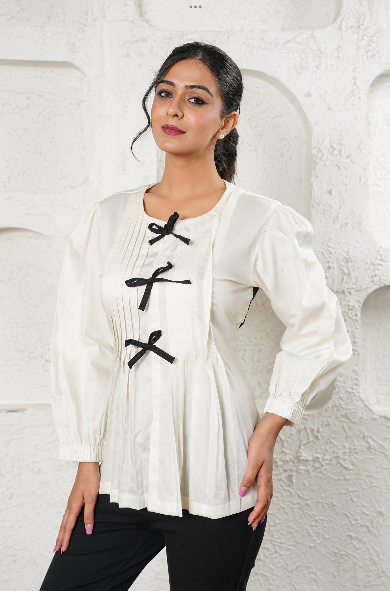 Ivory Pleated Top with Black Bow Accents